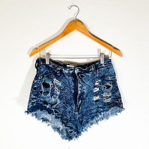 High waisted highly distressed shorts